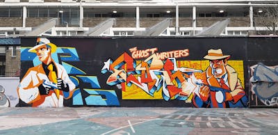 Orange and Light Blue Stylewriting by Tris and Core. This Graffiti is located in London, United Kingdom and was created in 2022. This Graffiti can be described as Stylewriting, Characters, Wall of Fame and Streetart.