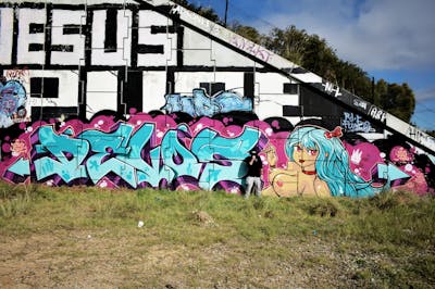 Cyan and Colorful Stylewriting by DEVOS. This Graffiti is located in Perth, Australia and was created in 2022. This Graffiti can be described as Stylewriting and Characters.