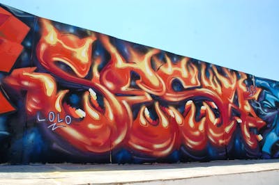 Red and Blue Stylewriting by Sesa. This Graffiti is located in Sevilla, Spain and was created in 2022. This Graffiti can be described as Stylewriting and Wall of Fame.