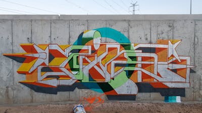 Colorful and Orange and Chrome Stylewriting by Zire. This Graffiti is located in Petah Tikva, Israel and was created in 2022.