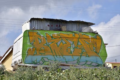 Orange and Light Green Stylewriting by Bief37. This Graffiti is located in Gqeberha, South Africa and was created in 2020. This Graffiti can be described as Stylewriting and Abandoned.
