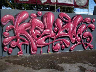 Coralle and Red Stylewriting by Kezam. This Graffiti is located in Auckland, New Zealand and was created in 2022. This Graffiti can be described as Stylewriting and 3D.