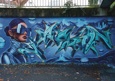 Cyan and Light Blue Stylewriting by Jason one. This Graffiti is located in Lüneburg, Germany and was created in 2023. This Graffiti can be described as Stylewriting, Characters and Streetart.
