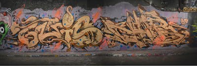 Gold and Colorful Stylewriting by TUIS, Chips, CDSK and smo__crew. This Graffiti is located in birmingham, United Kingdom and was created in 2021. This Graffiti can be described as Stylewriting and Wall of Fame.