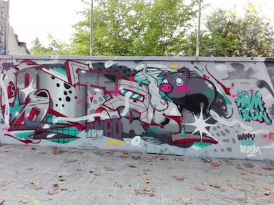 Grey and Colorful Characters by Arthur OneR. This Graffiti is located in Ireland and was created in 2022. This Graffiti can be described as Characters and Stylewriting.