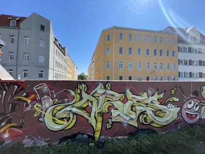 Beige and Brown Stylewriting by ORES24. This Graffiti is located in HALLE, Germany and was created in 2023. This Graffiti can be described as Stylewriting, Characters and Wall of Fame.