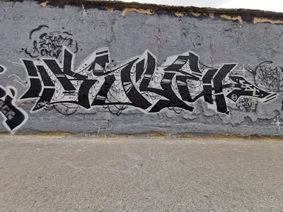 Grey Stylewriting by RULE, SSC and CWC. This Graffiti is located in Ljubljana, Slovenia and was created in 2021.