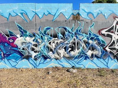 Grey and Light Blue Stylewriting by ECKS. This Graffiti is located in Perth, Australia and was created in 2022.