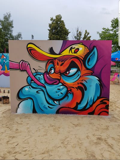 Light Blue and Orange Characters by tempz. This Graffiti is located in Silesia, Poland and was created in 2020.