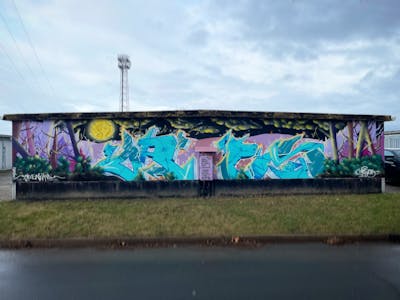 Colorful and Cyan Stylewriting by ORES24. This Graffiti is located in Wernigerode, Germany and was created in 2021. This Graffiti can be described as Stylewriting and Characters.