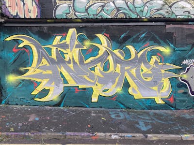 Cyan and Yellow Stylewriting by Micro79. This Graffiti is located in Newcastle, United Kingdom and was created in 2022. This Graffiti can be described as Stylewriting and Wall of Fame.