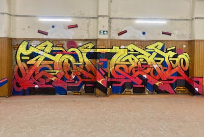 Red and Yellow and Blue Stylewriting by Toner2 and OTZ Crew. This Graffiti is located in Brussels, Belgium and was created in 2023. This Graffiti can be described as Stylewriting and Abandoned.
