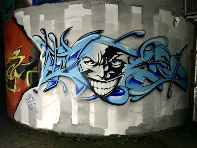 Grey and Light Blue Stylewriting by EmzG. This Graffiti is located in Zug, Switzerland and was created in 2022. This Graffiti can be described as Stylewriting and Characters.