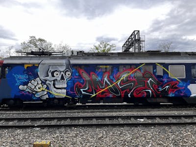 Colorful Stylewriting by omseg and Kosem. This Graffiti is located in Freiburg, Germany and was created in 2023. This Graffiti can be described as Stylewriting, Characters, Trains and Freights.