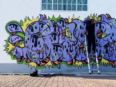 Colorful and Violet Stylewriting by Giusseppe. This Graffiti is located in CDMX, Mexico and was created in 2022. This Graffiti can be described as Stylewriting and Street Bombing.