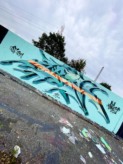 Cyan Stylewriting by Abik. This Graffiti is located in Hamburg, Germany and was created in 2021. This Graffiti can be described as Stylewriting and Wall of Fame.