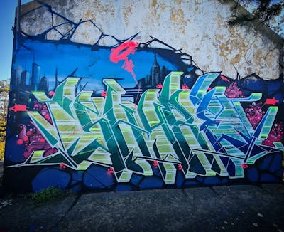 Cyan and Colorful Stylewriting by Shibe. This Graffiti is located in Setubal, Portugal and was created in 2023. This Graffiti can be described as Stylewriting and Characters.