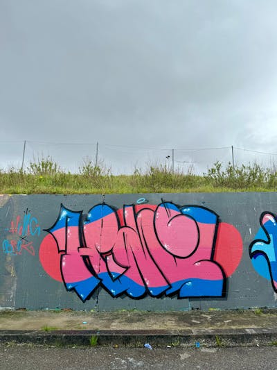 Coralle and Light Blue Stylewriting by Dr. Hione. This Graffiti is located in Portugal and was created in 2024.