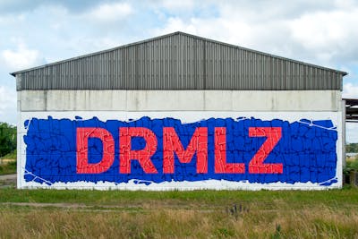 Blue and Red Stylewriting by Malz, Darm and DRMLZ. This Graffiti is located in Dessau, Germany and was created in 2020. This Graffiti can be described as Stylewriting, Murals and Streetart.