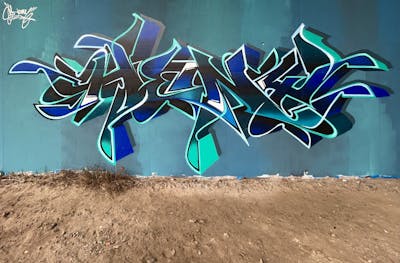 Cyan and Blue and Black Stylewriting by Heny. This Graffiti is located in Belgium and was created in 2023.