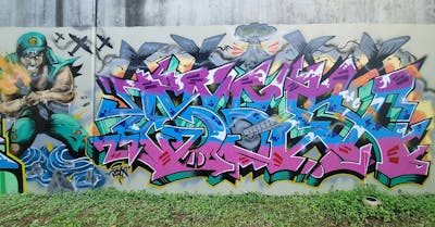 Colorful Stylewriting by ESSEX, TNC and MOC. This Graffiti is located in Australia and was created in 2024. This Graffiti can be described as Stylewriting and Characters.