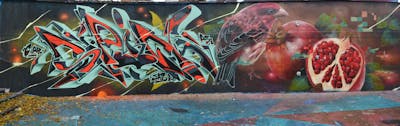 Red and Cyan and Orange Stylewriting by ASPIRE and Chips. This Graffiti is located in London, United Kingdom and was created in 2022. This Graffiti can be described as Stylewriting, Characters and Wall of Fame.