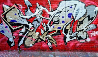 Grey and Beige and Red Stylewriting by royal and SIDOK. This Graffiti is located in London, United Kingdom and was created in 2022. This Graffiti can be described as Stylewriting and Wall of Fame.