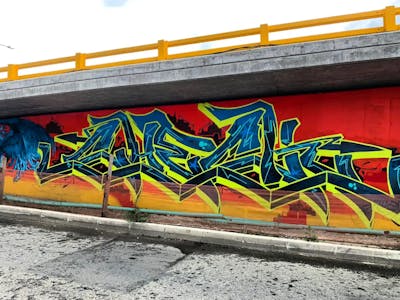 Yellow and Blue Stylewriting by Check91_. This Graffiti is located in Medellín, Colombia and was created in 2022.