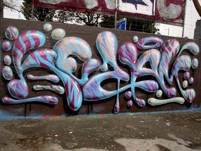 Colorful and Light Blue and Brown Stylewriting by Kezam. This Graffiti is located in Auckland, New Zealand and was created in 2023. This Graffiti can be described as Stylewriting, 3D and Wall of Fame.