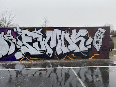 Black and Chrome Stylewriting by Fumok. This Graffiti is located in Oschatz, Germany and was created in 2022. This Graffiti can be described as Stylewriting, Characters and Wall of Fame.