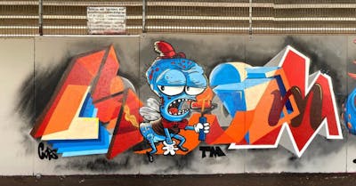Light Blue and Orange Stylewriting by Liam. This Graffiti is located in Koblenz, Germany and was created in 2021. This Graffiti can be described as Stylewriting, Characters, Wall of Fame and Futuristic.