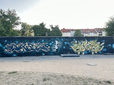 Cyan and Beige and Light Green Stylewriting by Gaps and Skaf. This Graffiti is located in Leipzig, Germany and was created in 2023. This Graffiti can be described as Stylewriting, Characters and Wall of Fame.