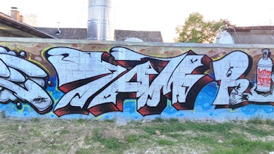 Chrome and Light Blue and Red Stylewriting by 7AM. This Graffiti is located in Omoljica, Serbia and was created in 2023.