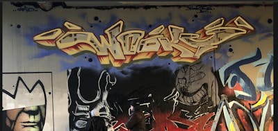 Orange and Grey Stylewriting by WOOKY. This Graffiti is located in Leipzig, Germany and was created in 2021. This Graffiti can be described as Stylewriting and Wall of Fame.