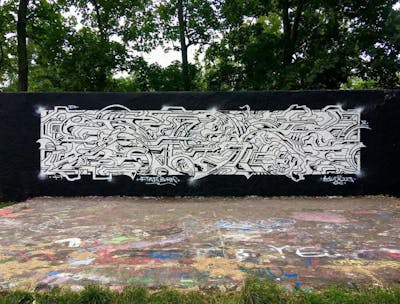 Chrome and Black Stylewriting by yudoe. This Graffiti is located in Prague, Czech Republic and was created in 2021. This Graffiti can be described as Stylewriting.