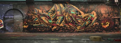 Orange and Black and Colorful Stylewriting by Chips. This Graffiti is located in London, United Kingdom and was created in 2020. This Graffiti can be described as Stylewriting, Characters and Wall of Fame.