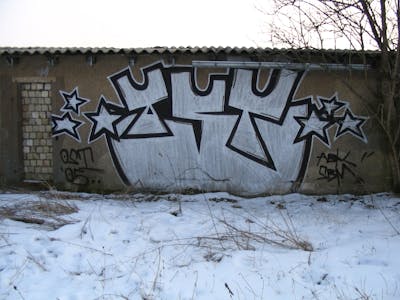 Chrome and Black Stylewriting by urine and OST. This Graffiti is located in Delitzsch, Germany and was created in 2005. This Graffiti can be described as Stylewriting and Street Bombing.