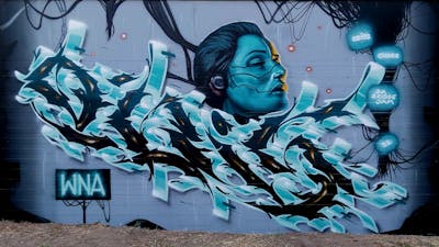 Cyan Stylewriting by CUORE, Obistwo and WNA CREW. This Graffiti is located in Ludwigsfelde, Germany and was created in 2022. This Graffiti can be described as Stylewriting and Characters.