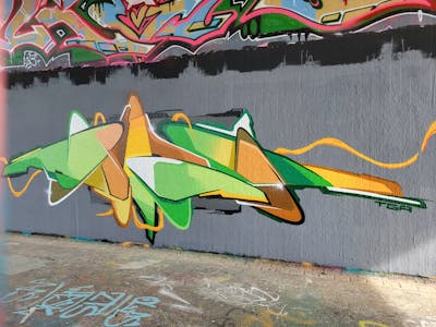 Light Green and Brown Stylewriting by Dirt. This Graffiti is located in Leipzig, Germany and was created in 2023. This Graffiti can be described as Stylewriting and Wall of Fame.
