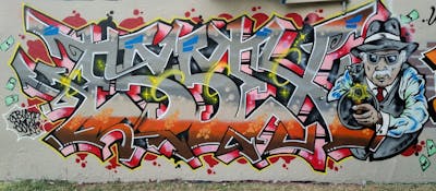 Colorful Stylewriting by ESSEX and TNC. This Graffiti is located in Australia and was created in 2023. This Graffiti can be described as Stylewriting and Characters.
