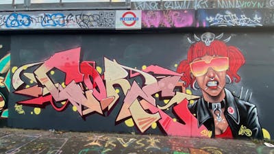 Coralle and Beige and Grey Stylewriting by Core246 and smo__crew. This Graffiti is located in London, United Kingdom and was created in 2023. This Graffiti can be described as Stylewriting, Characters and Wall of Fame.
