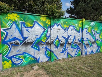Chrome and Blue and Light Green Stylewriting by LORD. This Graffiti is located in Caen, France and was created in 2023.