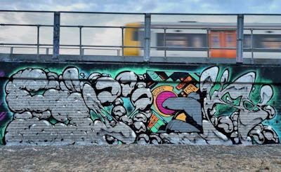 Chrome Stylewriting by SIDOK. This Graffiti is located in London, United Kingdom and was created in 2022. This Graffiti can be described as Stylewriting, Line Bombing and Characters.