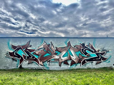 Brown and Cyan Stylewriting by News. This Graffiti is located in Walbrzych, Poland and was created in 2023.