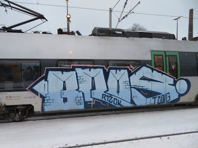 Light Blue and Blue Stylewriting by bros, rizok, R120K and teng. This Graffiti is located in Leipzig, Germany and was created in 2021. This Graffiti can be described as Stylewriting and Trains.
