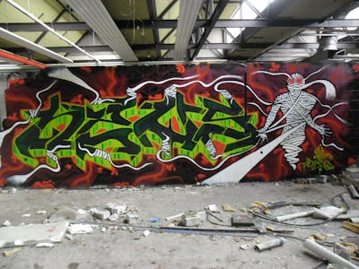 Red and Green Stylewriting by News. This Graffiti is located in Tilburg, Netherlands and was created in 2013. This Graffiti can be described as Stylewriting, Characters and Abandoned.