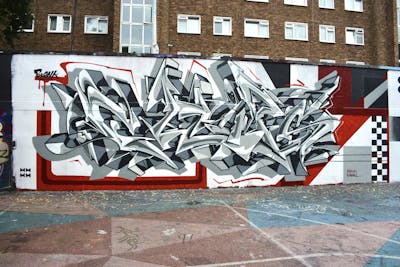 Grey and Red Stylewriting by ansleyrandall and Chips. This Graffiti is located in London, United Kingdom and was created in 2023. This Graffiti can be described as Stylewriting, Wall of Fame, Streetart and Murals.