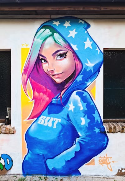 Colorful and Coralle and Light Blue Characters by Emty. This Graffiti is located in Frankfurt, Germany and was created in 2023.