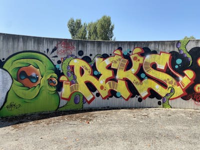 Colorful Stylewriting by REKS and SHARKO. This Graffiti is located in Bologna, Italy and was created in 2021. This Graffiti can be described as Stylewriting and Characters.