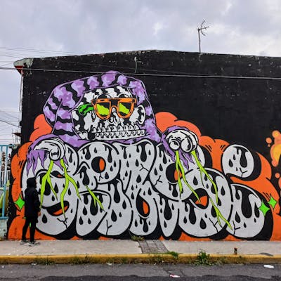 Chrome and Orange Stylewriting by Giusseppe. This Graffiti is located in CDMX, Mexico and was created in 2022. This Graffiti can be described as Stylewriting, Characters and Street Bombing.